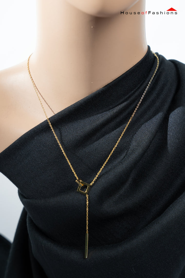 18K Gold Plated Square Link Necklace with elegant square design on a black fabric background.