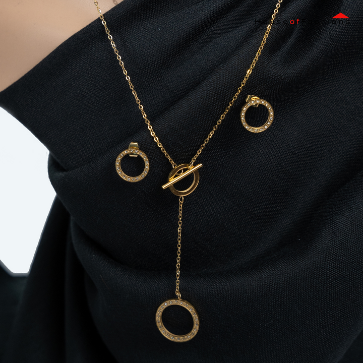 3-Piece 18K Gold Plated Jewelry Set featuring a circle necklace and earrings with sparkling cubic zirconia inlays.