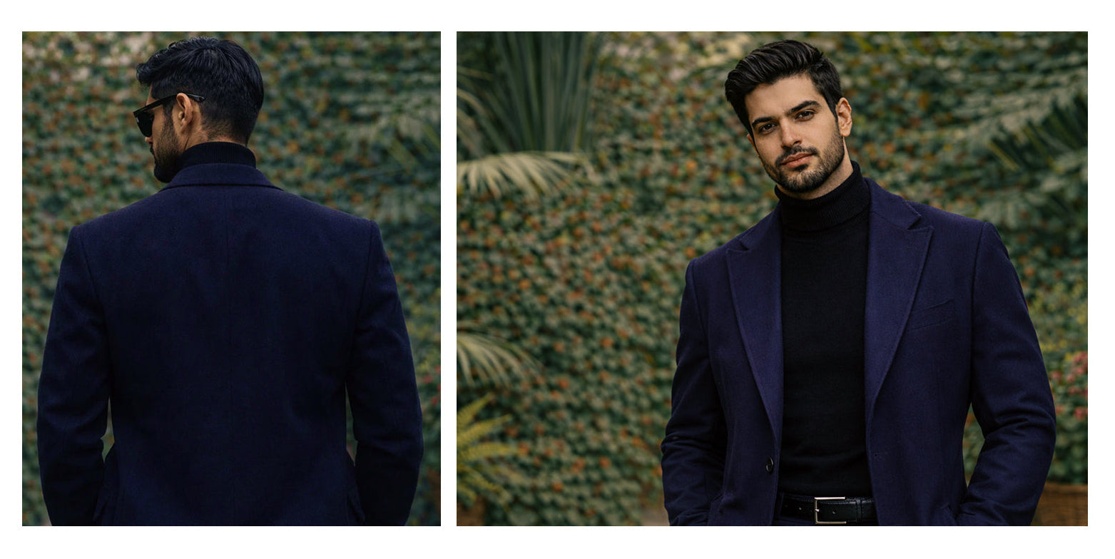 Man wearing a dark blue blazer over a black turtleneck